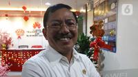 Menteri Kesehatan Terawan Agus Putranto mendatangi kantor Huawei di Wisma BRI 2, Jakarta, Kamis (23/1/2020). BRI menyatakan telah melakukan pengendalian risiko keselamatan bagi pekerja BRI dengan memberikan masker untuk seluruh pekerja Kantor Pusat Bank BRI. (Liputan6.com/Herman Zakharia)