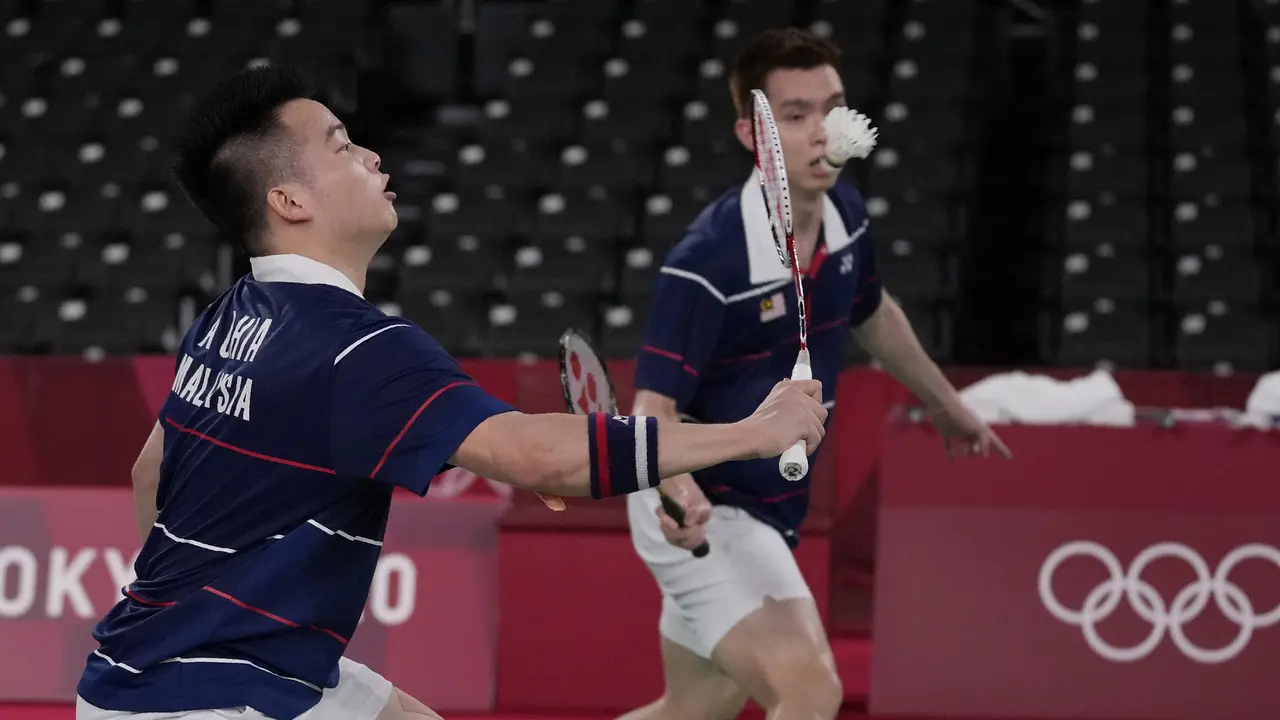 Foto: Petik Kemenangan ketiga, Mohammad Ahsan/Hendra Setiawan Lolos ke Perempatfinal sebagai Juara Grup D Bulu Tangkis Olimpiade Tokyo 2020