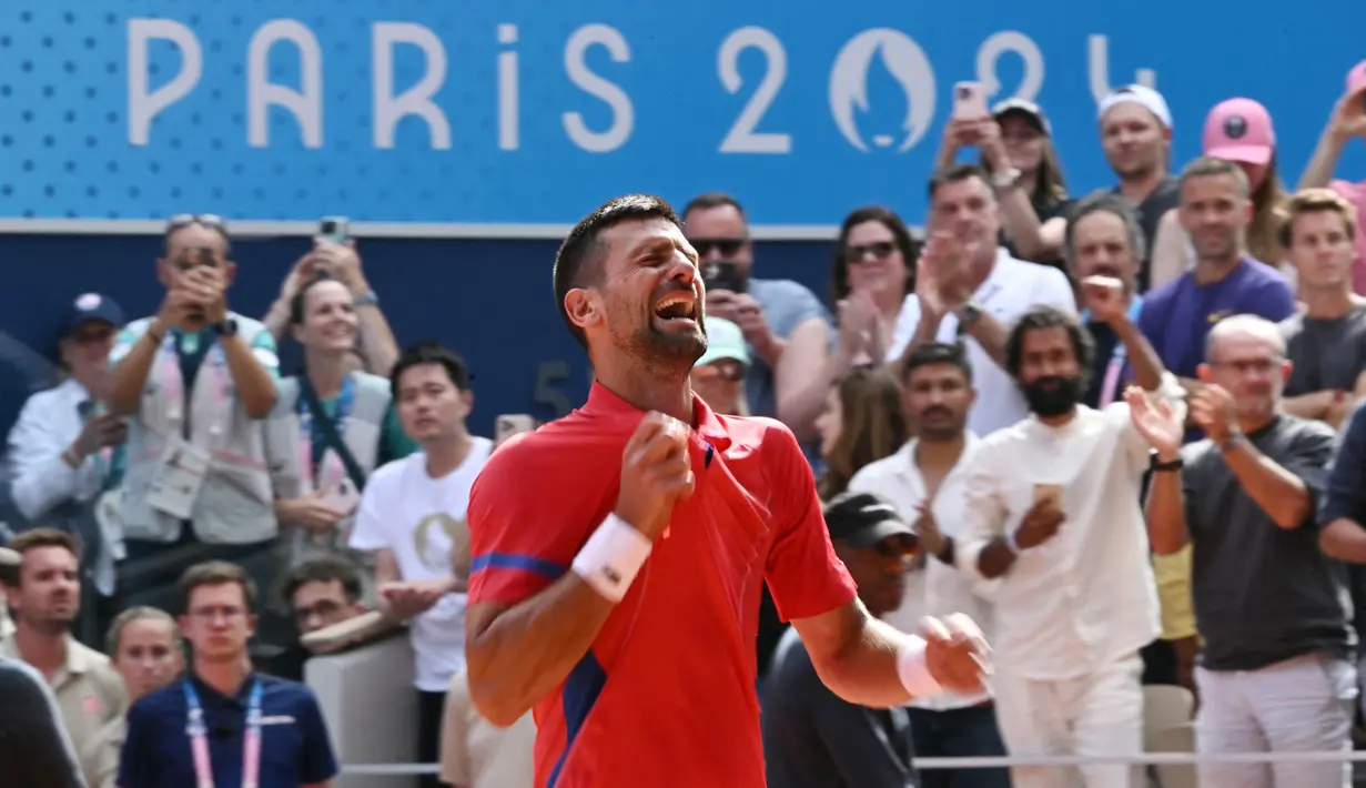 Novak Djokovic telah menamatkan tenis. Medali emas Olimpiade 2024 jadi kepingan terakhir yang membawa Djokovic melengkapi Golden Slam. (AFP/Carl De Souza)