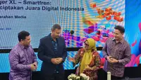 Konferensi pers merger XL Axiata dengan Smartfren. (Liputan6.com/Agustinus M. Damar)