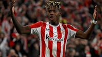 Pemain depan Athletic Bilbao asal Spanyol #10, Nico Williams, merayakan gol pertama timnya dalam pertandingan leg kedua babak 16 besar Liga Europa UEFA antara Athletic Club Bilbao dan AS Roma di stadion San Mames di Bilbao, pada 13 Maret 2025. (ANDER GILLENEA/AFP)