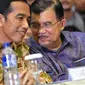 Jokowi dan JK terlihat berseri-seri setelah mengetahui dirinya menang dalam pilpres 2014, Jakarta, Selasa (22/07/2014) (Liputan6.com/Faizal Fanani)