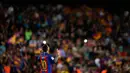 Lionel Messi usai mencetak gol ke gawang Eibar di stadion Camp Nou, Barcelona, Spanyol,(21/5). Dalam pertandingan ini Messi mencetak dua gol dan mengantar Barcelona menang 4-2 atas Eibar. (AP Photo / Manu Fernandez)