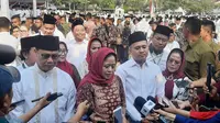 Ketua DPP PDIP Puan Maharani usai mengikuti peringatan Hari Santri Nusantara di Tugu Pahlawan Surabaya, Jawa Timur. (Liputan6.com/Dicky Agung Prihanto)