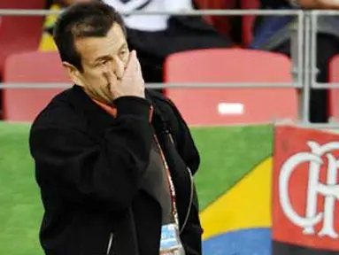 Ekspresi pelatih Brasil Carlos Dunga di laga perempat final PD 2010 lawan Belanda di Nelson Mandela Bay Stadium, Port Elizabeth, 2 Juli 2010. Brasil kalah 1-2. AFP PHOTO / FABRICE COFFRINI 