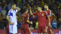 Spain players celebrate a goal durng their Euro 2016 Group C qualification soccer match against Luxembourg in Logrono, Spain October 9, 2015. REUTERS/Vincent West