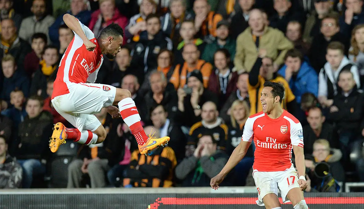 Arsenal segera bangkit dengan menorehkan hasil tak terkalahkan selama 11 kali pertandingan Liga Inggris pada periode 10 Februari sampai 2 Mei. The Gunners sukses meraih sembilan kemenangan dan dua kali seri. (AFP/Oli Scarff)