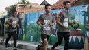 Peserta fun run saat mengikuti event lari bertajuk 'Run and Snap in Tangerang 5k' di Tangerang, Minggu (8/3/2020). Novotel Tangerang gelar event lari yang diikuti ratusan peserta. (Dokumentasi)