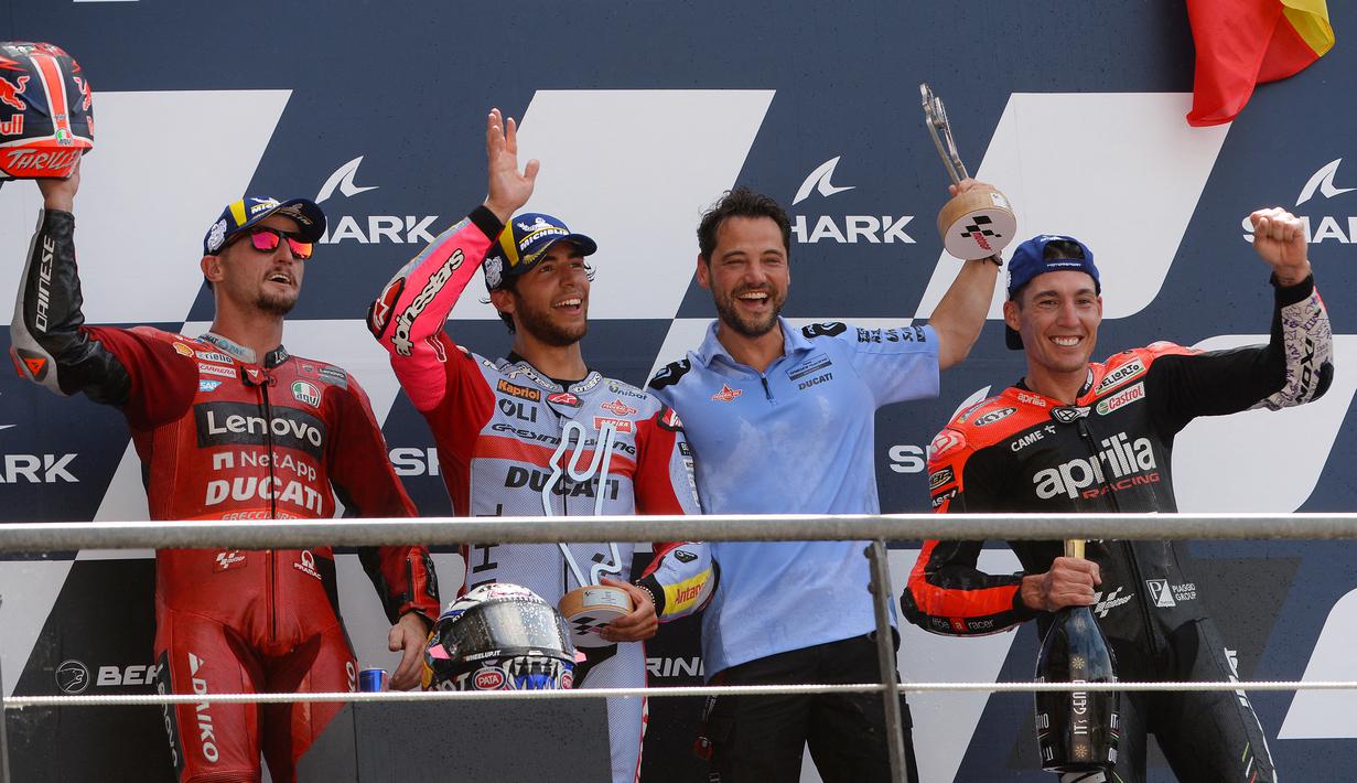 Posisi kedua di MotoGP Prancis ditempati oleh Jack Miller yang merupakan rekan setim Francesco Bagnaia dan tempat ketiga direbut oleh pembalap dari tim Aprilia Factory, Aleix Espargaro. (AFP/Jean-Francois Monier)