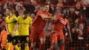 Bek Liverpool, Mamadou Sakho, merayakan gol yang tercipta ke gawang Dortmund pada laga Liga Europa di Stadion Anfield, Inggris, Jumat (15/4/2016) dini hari WIB. Liverpool lolos ke semifinal berkat agregat skor 5-4. (AFP/Oli Scarff)