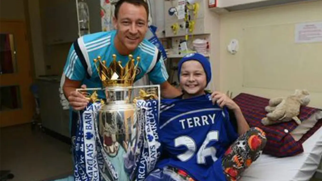 Kapten Chelsea, John Terry dan fans cilik Tommi Miller (Liputan6)