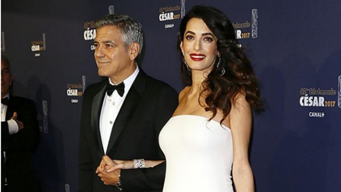George Clooney dan Amal Alamuddin (Francois Mori/AP Photo)