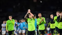 Ekspresi pemain Manchester United setelah laga kontra Real Sociedad pada matchday keenam fase grup Liga Europa 2022/2023 di Stadion Anoeta, Jumat (4/11/2022) dini hari WIB. (AFP/Ander Gillenea)