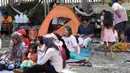 Warga berlindung di lapangan balai kota, Provinsi Sarangani, Filipina, Rabu 10 Juni 2026. (AP Photo/Basilio Sepe)