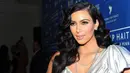 Bukan Kim Kardashian kalau tidak menjadi pusat perhatian masyarakat. Banyak yang memuji, banyak pula yang memberikan hujatan kepadanya. Terlebih para haters yang seringkali mengomentarinya. (AFP/Alberto E.Rodriguez)