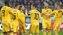 Para pemain Belgia merayakan gol yang dicetak Eden Hazard ke gawang Rusia pada laga Kualifikasi Piala Eropa 2020 di Gazprom Arena, Saint Petersburg, Sabtu (16/11). Rusia kalah 1-4 dari Belgia. (AFP/Olga Maltseva)