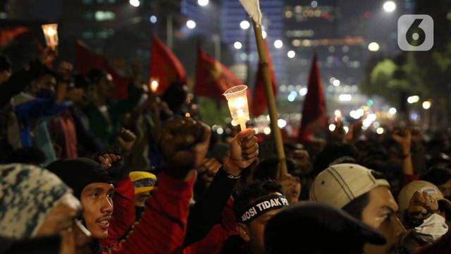 Nyala Lilin Sudahi Aksi Unjuk Rasa Tolak Pengesahan Omnibus Law UU Cipta Kerja