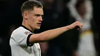Gelandang Jerman bernomor punggung 17, Florian Wirtz, merayakan gol pembuka dalam pertandingan semifinal Liga Bangsa-Bangsa UEFA antara Jerman dan Portugal di Munich, Jerman Selatan, Kamis dini hari WIB (5-6-2025). (Tobias SCHWARZ/AFP)