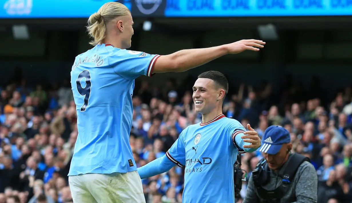 Meski MU berhasil memperkecil kedudukan lewat Antony dan Anthony Martial, dua hattrick yang dicetak Haaland dan Foden mampu bertahan hinggal laga usai. Laga berakhir dengan kemanangan 6-3 Manchetser City. (AFP/Lindsey Parnaby)