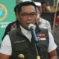 Gubernur Jawa Barat Ridwan Kamil memberikan keterangan kepada pers usai mendapatkan suntik vaksin Covid-19 di Puskesmas Garuda, Kota Bandung, Jumat (28/8/2020). (Liputan6.com/Huyogo Simbolon)