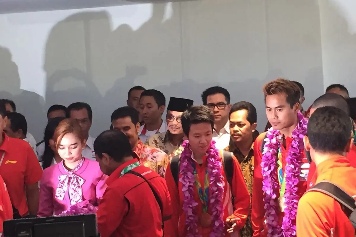 Tontowi Ahmad/Liliyana Natsir mendapat sambut luar biasa setibanya di Bandara Soekarno Hatta, Selasa (23/8/2016). (istimewa)