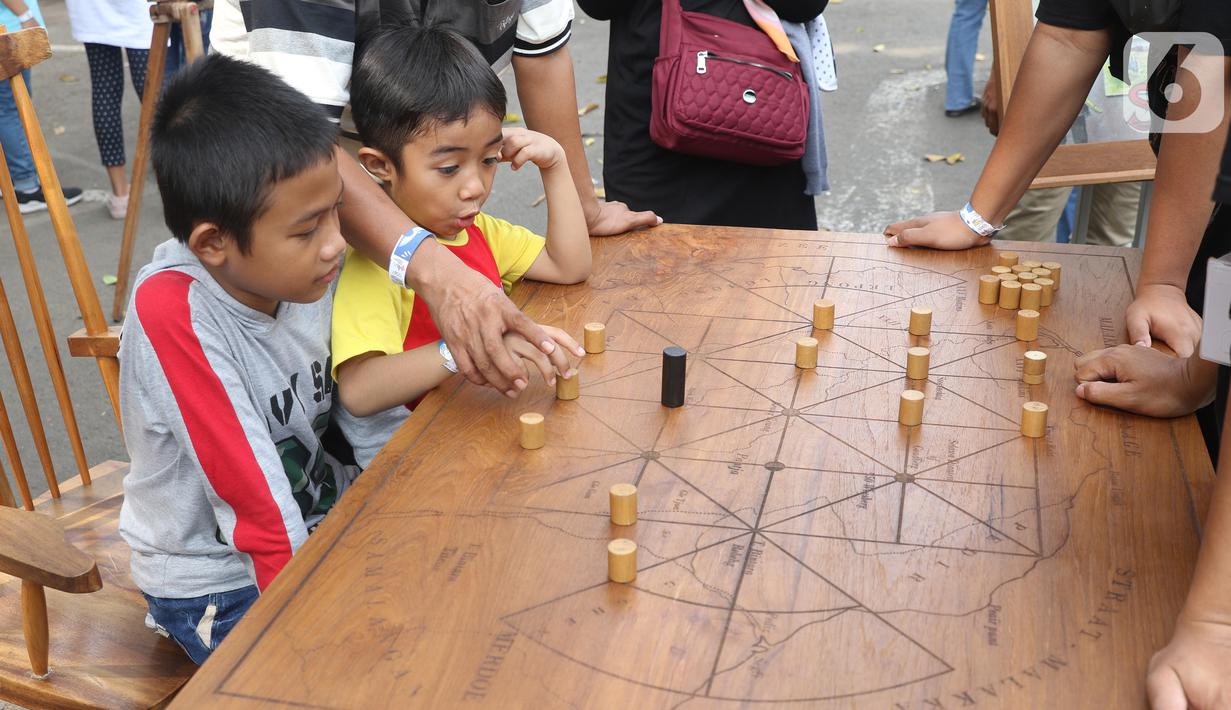 FOTO: Bernostalgia dengan Permainan Tradisional di Pekan Kebudayaan - Kesenian Permainan Dan Olah Raga Tradisional