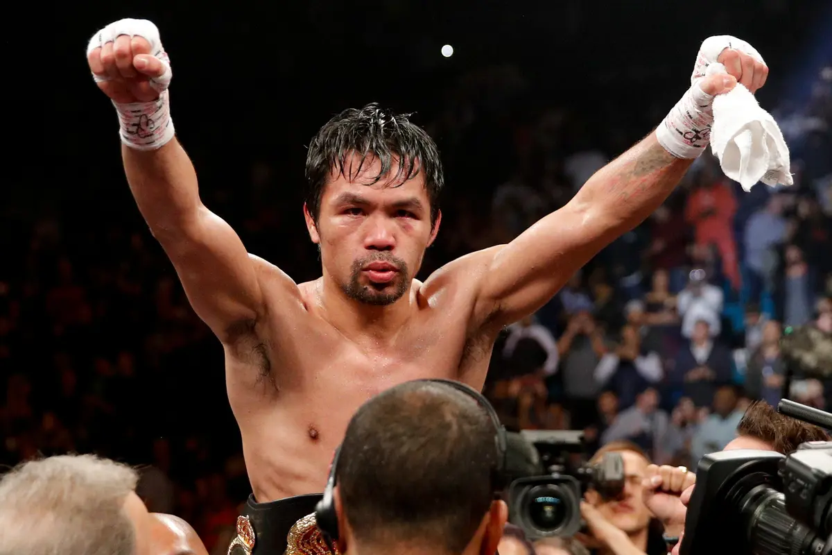 Manny Pacquiao Berhasil Taklukkan Adrien Broner