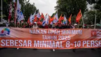 Aksi unjuk rasa para buruh mendapat pengawalan 1.270 personel keamanan gabungan. (JUNI KRISWANTO/AFP)