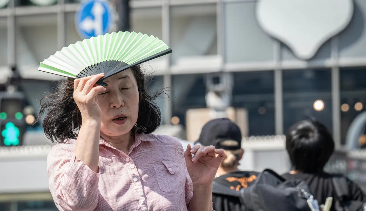Suhu panas ekstrem di Jepang diperkirakan akan terus naik. (Yuichi YAMAZAKI/AFP)