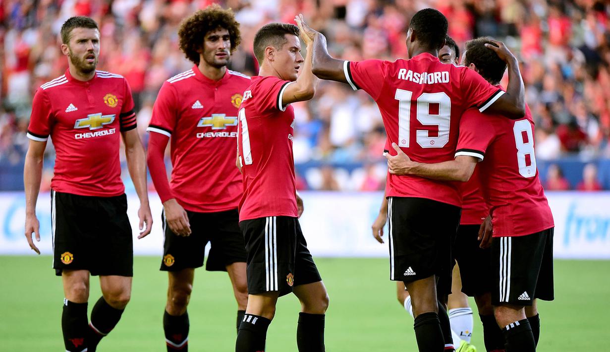 3. Manchester United (Sepak Bola) - 3,69 miliar dolar (Rp 49,2 triliun). (AFP/Harry How)