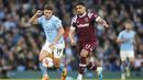 Man City mengoleksi 79 poin dari 33 laga, sedangkan Arsenal tertinggal satu poin meski sudah memainkan 34 laga. (AP Photo/Dave Thompson)
