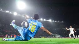 Kiper Mali, Djigui Diarra, menjadi pahlawan dengan menggagalkan dua penalti Tunisia dari Elias Achouri dan Mohamed Ali Ben Romdhane. (AFP/Paul Ellis)