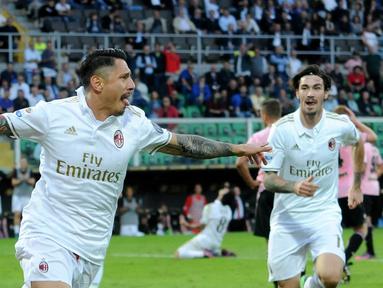 AC Milan meraih kemenangan 2-1 atas Palermo dalam laga pekan ke-12 Serie A yang berlangsung di Stadion Renzo Barbera, Minggu (6/11/2016). Gianluca Lapadula mencetak gol penentu kemenangan AC Milan. (AFP)