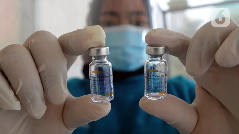 FOTO: Puskesmas di Jakarta Mulai Lakukan Vaksinasi Virus Corona COVID-19