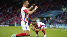 Tiga gol Kroasia yang diborong oleh Nikola Vlasic, Luka Modric, dan Ivan Perisic membuat Skotlandia tersingkir dari ajang Euro 2020 karena terdampar di dasar grup dengan nilai satu. (Foto: AP/Pool/Petr David Josek)