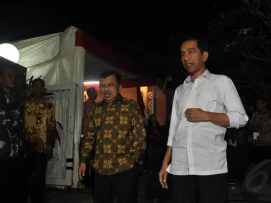 Jokowi dan Jusuf Kalla menghadiri acara pembubaran Kelompok Kerja Tim Transisi di Rumah Transisi, Jakarta, (28/9/14). (Liputan6.com/Miftahul Hayat)