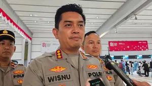 Polres Bandara Soetta Bagikan Masker dan Cek Kesehatan Calon Penumpang