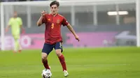 Pada laga tersebut ada salah satu pemain yang mampu mencuri perhatian yakni pemain muda Spanyol, Pablo Martin Paez Gavira alias Gavi. (AP/Antonio Calanni)