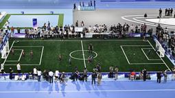Hephaestus Universitas Tsinghua bersua dengan HTWK Robotics+Nao Devils Jerman dalam laga final tersebut. Pertandingan berlangsung sekitar 15 menit dalam setiap babak. (AFP/Pedro Pardo)