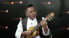 Unang membawakan lagu Assalamu'alaikum Ya Ustad secara akustik di Liputan6.com