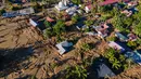 Foto udara menunjukkan kerusakan akibat banjir di Meureudu, Kabupaten Pidie Jaya, Provinsi Aceh, pada 30 November 2025. Kabupaten Pidie Jaya, Provinsi Aceh dilanda bencana Hidrometereologi setelah hujan lebat mengguyur wilayah itu selama tiga hari berturut-turut, mulai Selasa (25/11/2025) hingga Kamis (27/11/2025). (CHAIDEER MAHYUDDIN/AFP)