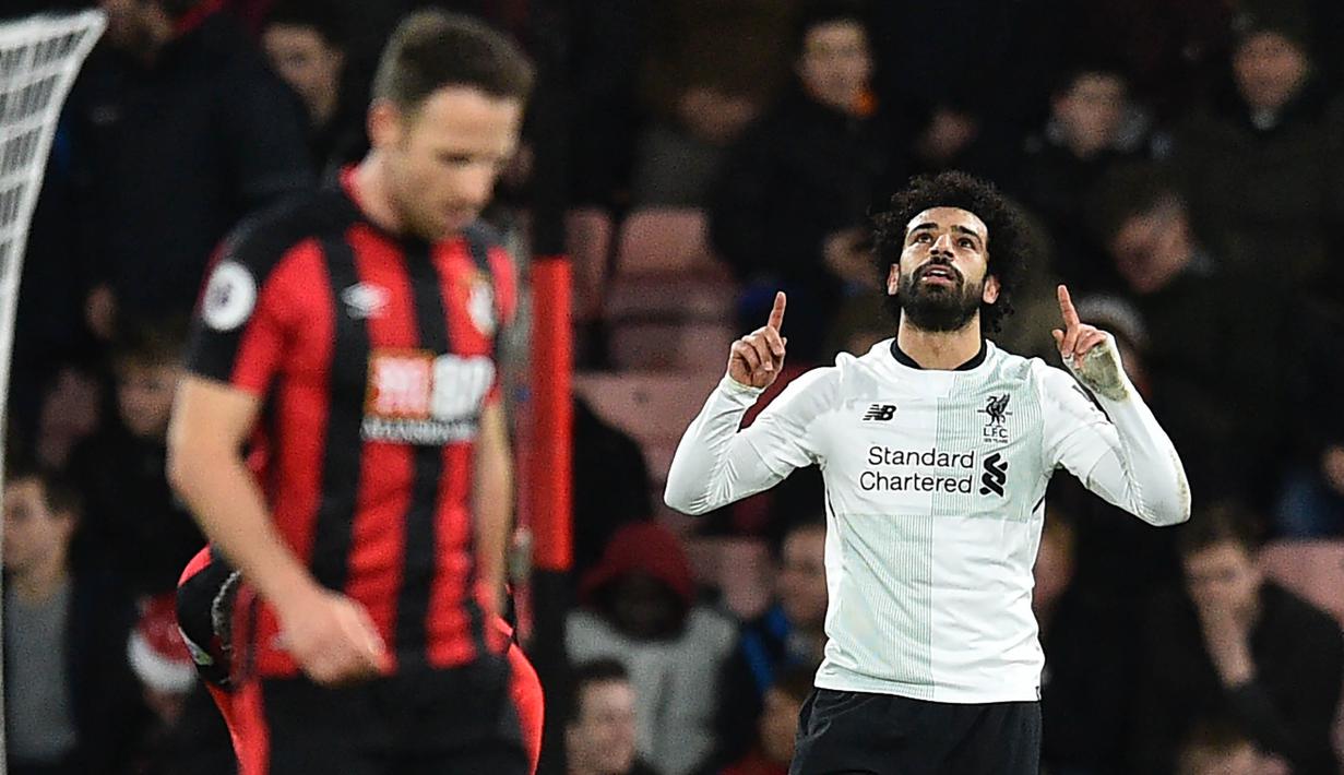 1. Mohamed Salah (Liverpool) - 14 Gol. (AFP/Glyn Kirk)