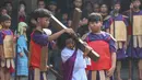 Tablo Jalan Salib menjadi medium penghayatan kesengsaraan Yesus dalam menerima kesengsaraan penebusan dosa semua umatnya. (merdeka.com/Arie Basuki)