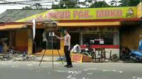 Subdit Gakkum Polda Jabar melakukan olah tempat kejadian perkara (TKP) kecelakaan beruntun di Jalan Raya Puncak, Bogor, Jawa Barat.&nbsp;(Foto:Liputan6/Achmad Sudarno)
