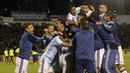 Para pemain Argentina merayakan keberhasilan lolos ke Piala Dunia 2018 usai mengalahkan Ekuador di Stadion Olimpico Atahualpa, Quito, Selasa (10/10/2017). Sempat tertinggal, Argentina akhirnya menang 3-1 atas Ekuador. (AP/Fernando Vergara)