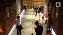 Misa Malam Natal 2024 menjadi penanda kali pertama terowongan silaturahim digunakan oleh masyarakat umum, khususnya para jemaaat Gereja Katedral Jakarta, sejak diresmikan Presiden Prabowo Subianto pada Kamis (12/12/2024) lalu. (Liputan6.com/Herman Zakharia)