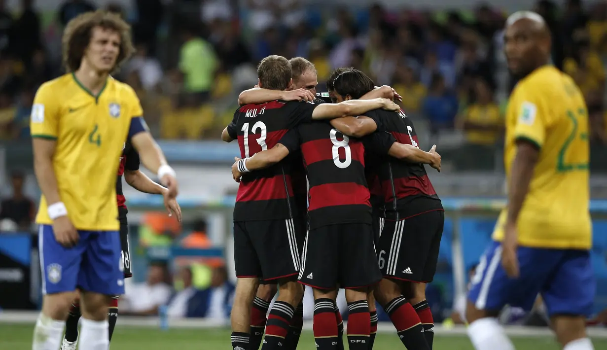 Pada Piala Dunia 2014, Joachim Loew membawa Jerman tampil sebagai kampiun. Tuan rumah Brasil di hancurkan 7-1 di babak semifinal yang menjadi kekalahan teburuk tim Samba sepanjang sejarah Piala Dunia. (AFP/Adrian Dennis)