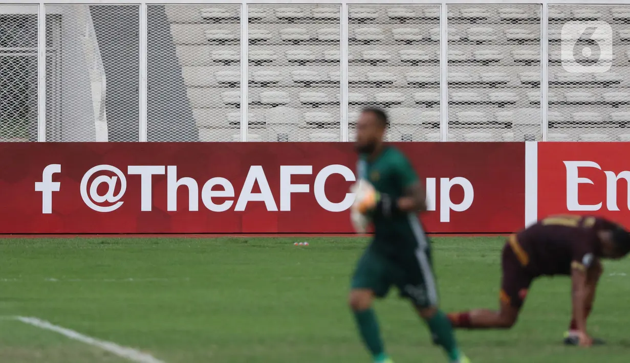 Suasana Stadion Madya Gelora Bung Karno saat laga kualifikasi Grup H Piala AFC 2020 antara PSM Makassar melawan Kaya FC-Iloilo, Jakarta, Selasa (10/3/2020). Pertandingan dilaksanakan tanpa dihadiri penonton sebagai antisipasi penyebaran virus Corona COVID 19. (Liputan6.com/Helmi Fithriansyah)