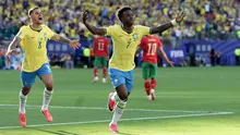 Pemain Timnas Brasil, Vinicius Junior, merayakan gol yang dicetaknya ke gawang Maroko dalam laga pertama Grup C Piala Dunia 2026 di East Rutherford, New Jersey, Minggu (14/6/2026) pagi WIB. (AP Photo/Adam Hunger)