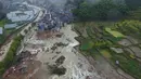 Penampakan tanah longsor yang disebabkan oleh hujan deras yang dibawa oleh Topan Megi, di Sucun Village, Lishui, provinsi Zhejiang, Cina, (29/9). Badai berkecepatan 120 Km/jam itu telah melumpuhkan aktivitas di Kota tersebut. (China Daily/via REUTERS)